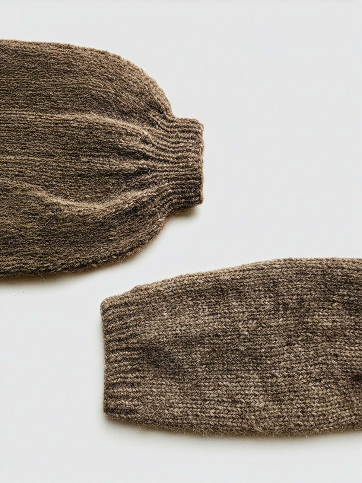 Knitted sleeves for the The Mild Sweater - different details same pattern.